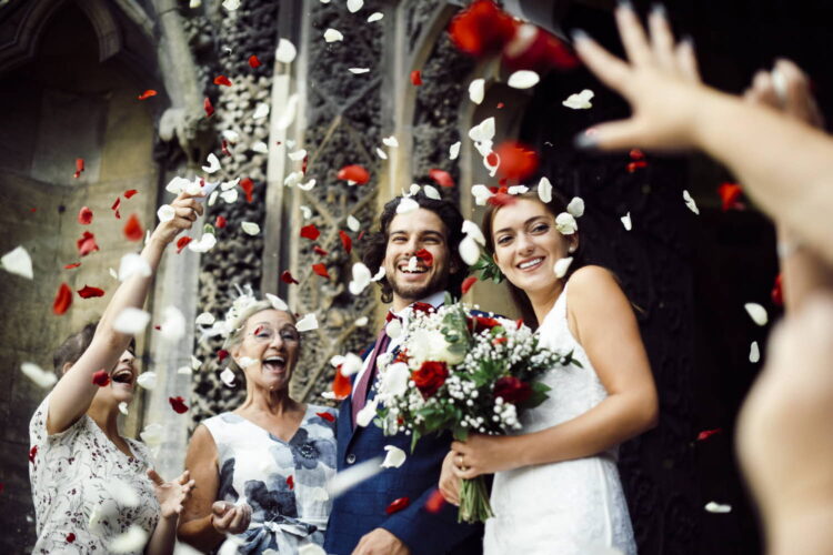 family-throwing-rose-petals-at-the-newly-wed-bride-2022-12-16-00-29-33-utc